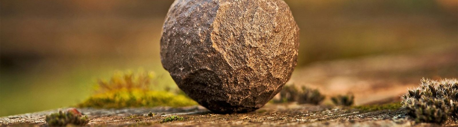 page hero, a rock on a beach